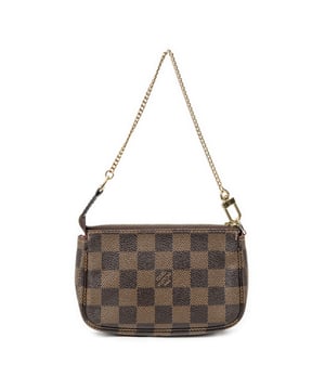 Louis Vuitton Accesorios Mini Pochette Accessoires  Bolsa en Marrón Lona recubierta y Latón dorado hardware. El producto esta en Excelentes Condiciones (A).
  Dimensiones: 15x10x2 cm 
  Accesorios incluidos: None
  Notas de Hardware: Ligeramente descolorido
  BrandCo Paris encuentra artículos raros y en las mejores condiciones a precios increíbles. ¡Vale la pena tener paciencia! Compra con confianza: todos los artículos de BrandCo Paris son seleccionados y autenticados cuidadosamente por nuestro equipo de expertos.
  Todos los artículos vienen con un certificado de autenticidad y un embalaje entregado por BrandCo Paris.
  Tabla de clasificación de la condición del artículo
  N (como nuevo)
  AA (perfecto estado)
  A (excelente estado)
  AB (muy buen estado)
  B (bueno/regular)