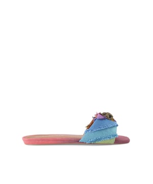 The Kurt Geiger Kensington Flat Sandal, an addition to the Kensington Collection, is crafted from a bleached denim in the iconic rainbow stripe design. The antiqued brass eagle head features crystals and black eyes on the strap.
