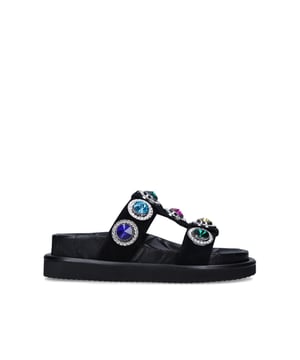 The Orson Crystal Sandal arrives in a black suede. The strap is topped with oversized multi-colour crystals. Overstitched quilted insole with padding, seen across the collections.