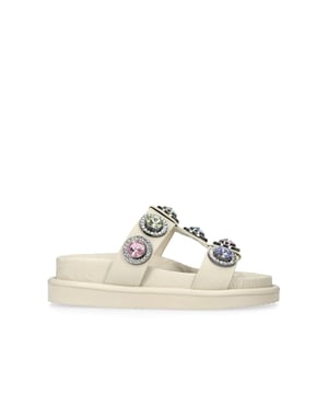 The Orson Crystal Sandal arrives in a sleek bone. The strap is topped with oversized multi-colour crystals. Overstitched quilted insole with padding, seen across the collections.