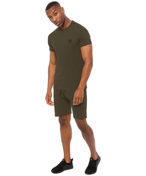 Stay stylish and comfortable with this Enzo set. The muscle-fit T-shirt, made from extra stretch fabric, features a crew neck, short sleeves, and embroidered logo. The fleece shorts include an elasticated drawstring waist, two pockets, and matching logo embroidery. Perfect for workouts, weekends, or casual wear.