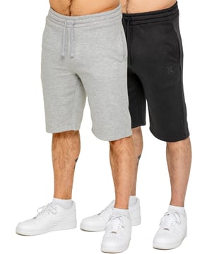 Stay comfortable and stylish with these KRUZE men's shorts, available in a convenient 2-pack. Designed with two front side pockets to keep your essentials secure, these shorts feature an adjustable elasticated waistband with drawstrings for a perfect fit. The stylish printed logo adds a modern touch. Lightweight and easy to wear, they're ideal for everyday use, whether for casual outings or workwear. Suitable for spring, summer, and autumn, these versatile shorts are perfect for holidays, outdoor activities, sports, gym sessions, training, running, or jogging. Made from a breathable and durable blend of 50% cotton and 50% polyester, they offer both comfort and performance. Machine washable for easy care and available in 6 colour options.