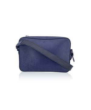VINTAGE, RRP AS NEW
This beautiful Bag will come with a Certificate of ity provided by Entrupy. The certificate will be provided at no further cost  Step into the timeless elegance of Italian craftsmanship with this Forever Fendi Fade Camera Bag, a true tribute to the house's bold design legacy. Wrapped in rich blue leather, this crossbody tells a story of luxury reimagined for the modern collector.  The front is adorned with the iconic embossed Zucca FF logo, gracefully faded like a memory in motion - a nod to Fendi's heritage that whispers rather than shouts. The silver-tone hardware catches the light just enough to make a statement, while the sleek zip-top closure adds a practical touch to its refined silhouette.  Its single shoulder strap - a striking blend of black and blue leather - adds depth and contrast, letting the bag swing effortlessly between polished city wear and edgy street style. Inside, the black fabric lining reveals thoughtful compartments: a dedicated interior pocket paired with structured card slots for sleek organization.  A discreet 'Fendi - Made in Italy' tag sits proudly inside, with the ity serial number tucked behind - a quiet reassurance of origin for the discerning collector.  A rare find for lovers of second-hand sophistication, this camera bag is more than an accessory - it's a chapter from Fendi's evolving story, waiting to be carried forward. Condition Rating: A - EXCELLENTCondition Details: Gently used. Light scratches on the shoulder strap. Please check the photos carefully and ask if you need to know more details or if you have any doubts.Measurements (cm):Depth: 5.1Height: 15.2Length: 22.9Other Details: Dustbag? YesKeys? NoBox? No Measurments:  width: 51 mm length: 229 mm height: 152 mm strap length: 0 mm handle drop: 0 mm