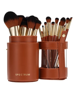 Transform your makeup routine with the Spectrum Pantherine 20-Piece Professional Brush Set. This stunning collection features glossy tapered handles and opulent gold hardware, paired with dark-toned bristles for a luxurious touch. Whether you are a beginner or a seasoned pro, this versatile set is perfect for all skill levels. Housed in a stylish brush canister, it includes essential brushes for every application, from foundation to detail work. Upgrade your beauty arsenal and achieve flawless looks effortlessly with this chic and practical brush set.