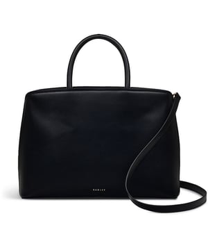 Bolso de mano Radley Bow Street para mujer en negro, fabricado en cuero. Con características: asas enrolladas, correa de hombro ajustable, múltiples compartimentos, cierre magnético y dimensiones de 32 x 22 x 11 cm.