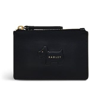 Bolso acolchado negro para mujer de Radley, fabricado con cuero. Presenta: perro scottie acolchado, cierre de cremallera, tres ranuras para tarjetas, tirador de cremallera de cuero y medidas de 12 cm de ancho x 8 cm de alto.