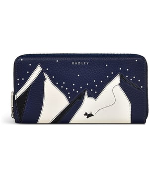 Monedero Radley Mountain Wanderers para mujeres en azul, fabricado en cuero. Cuenta con: seis ranuras para tarjetas, bolsillo con cremallera para monedas, secciones para billetes, cierre completo con cremallera y dimensiones de h9 x w19 x d3 cm.