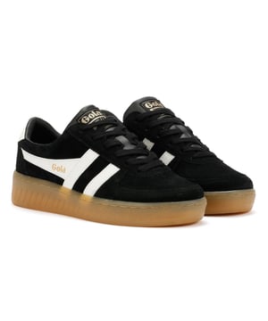 Heritage inspired court style trainers crafted with a premium suede upper for a timeless, retro look. Designed with a classic silhouette and finished with a durable gum rubber sole for superior grip and vintage appeal. Perfect for casual streetwear.