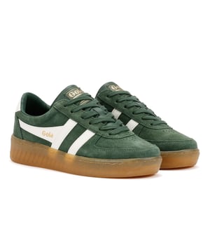 Heritage inspired court style trainers crafted with a premium suede upper for a timeless, retro look. Designed with a classic silhouette and finished with a durable gum rubber sole for superior grip and vintage appeal. Perfect for casual streetwear.