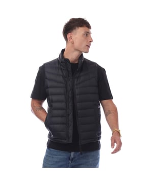 Hugo Olmeev Gewatteerd Gilet voor heren.- Hoge hals.- Volledige ritssluiting.- 2 zakken met knoopsluiting.- Gewatteerd.- Rubberen logopatch op achterkant.- Slanke pasvorm. Materiaal: 100% polyamide. Ref: 50440607404.