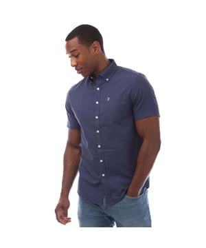 Heren Farah Drayton Korte Mouw Shirt.- Knoopsluiting kraag.- Korte mouwen.- Volledige knoopsluiting.- Borstzak.- Geborduurd Farah Logo.- Moderne pasvorm. Materiaal: 65% polyester, 35% katoen. Ref: FAWB6006901.