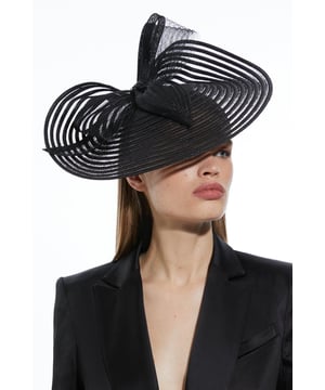 Get dressed up and finish the look with a fascinator, with a statement, large size and bow detailing, fitted onto a comfortable headband. Styles perfectly with a dress or pantsuit in matching tones for a look ideal for wedding guest days and days at the racecourse. Bow Detail Fascinator On Trend, Three Dimensional Bow Detailing Sheer, Asymmetric Disc Base Statement Large Size Easy to Wear HeadbandBrowse this seasons women's fascinators or discover the full range of women's accessories now.