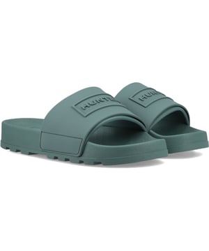 Ontspan in stijl met de Dames Embossed Siliconen Slider, voorzien van een lichtgewicht EVA-voetbed dat is gevormd naar de vorm van de voet voor uitzonderlijk comfort en ondersteuning.