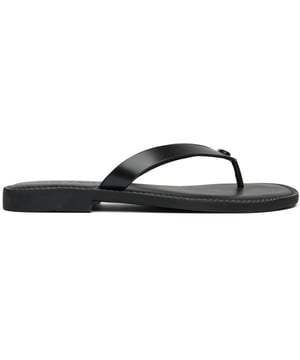 The Coach Brianna sandals bring luxury to casual summer style. These elegant black flip flops feature a premium leather upper that offers both sophistication and durability. The rubber sole provides reliable traction and comfort for all-day wear. A subtle Coach embellishment adds a refined touch to these versatile sandals. Perfect for pairing with sundresses or your favorite denim, these Briannas combine classic simplicity with the quality craftsmanship you expect from Coach.