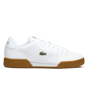 The Lacoste Carnaby Cup brings timeless court style to your everyday rotation with clean white synthetic uppers and the signature embroidered crocodile. Built for all-day comfort with Ortholite insoles and a durable rubber sole, these trainers effortlessly bridge the gap between athletic heritage and casual sophistication. A modern take on classic tennis aesthetics that works just as well courtside as it does on city streets.