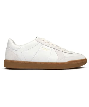 The Coach Ellis brings sophisticated style to your casual wear. These sleek white leather court trainers combine understated elegance with everyday versatility. Crafted with premium leather uppers that offer durability and comfort, they sit on a supportive rubber sole for reliable traction. The minimalist design features subtle Coach branding, making these trainers perfect for pairing with everything from jeans to dresses when you want that polished yet relaxed look.