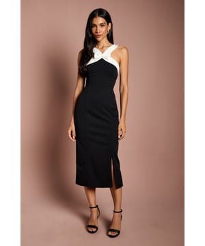 Striking cross neck design with elegant bow detail for a sophisticated touch
        Figure-enhancing pencil silhouette with a flattering midi length
        Side split detail adds movement and ease of wear
        Contrast halterneck straps create a dramatic, eye-catching effect
        Structured woven fabric with slight stretch for comfort and shape retention
    
    This Coast pencil dress commands attention with its architectural cross neck and distinctive bow detail. The sleek, tailored silhouette skims your curves beautifully while the midi length and side split strike the perfect balance between sophistication and allure. Style with strappy heels and minimal jewellery for race day elegance, or pair with a structured clutch and delicate earrings for wedding guest perfection. The halterneck design showcases shoulders and collarbones beautifully, whilst the contrast detailing creates a striking visual interest that will turn heads at any formal occasion. For cooler evenings, drape a tailored blazer over your shoulders for an effortlessly chic finishing touch. This versatile dress transitions seamlessly from daytime celebrations to evening affairs with a simple change of accessories.