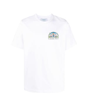 The Casablanca Vue De Damas White T-shirt is crafted from 100% premium cotton, ensuring exceptional comfort and breathability throughout the day. Made in Portugal with meticulous attention to detail, this T-shirt combines quality craftsmanship with a sleek, minimalist design. Its crisp white color offers versatile styling options, making it a perfect staple for any wardrobe. Experience the blend of luxury and casual ease with this timeless piece that elevates your everyday look effortlessly