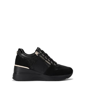 This Carvela High Rise trainer is crafted from a black textured fabric with black crystal embellished panels. The front laces up and there are gold tone details across the upper. The sole is lifted at the heel.