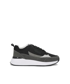 This Johnno sneaker is crafted from a black, grey and white leather alternative. There are tubular laces with black branded metal details across the sneaker.
