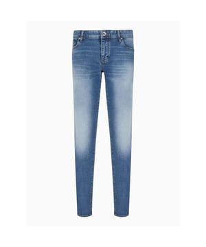 Skinny fit jeans made of stretch cotton denim with indigo workmanship that ensures maximum color rendering. The 5-pocket model features zip and button closure  metal rivets  belt loops and contrasting stitching.
