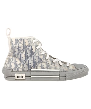 VINTAGE, RRP AS NEW
 Step up your sneaker game with the Dior B23 League High-Top Sneakers, crafted in crisp white canvas and detailed with tonal Dior branding for a clean, contemporary finish. The high-top silhouette and rubber sole offer both comfort and urban-chic appeal. **Style tip:** Pair them with cropped trousers or a flowy midi dress to add a sporty-luxe twist to your everyday look.

Dior B23 League High-Top Sneakers in White Canvas

Condition: Very good
Signs of wear: Include Box., Minor markings, Lightly used but very well maintained. Minor mark at soles & creasing, light scuffing at the soles and heels.
Packaging: Box
Color: White
Material: Canvas 
Size: EU | 42
Measurements: Heel height: 40; Insole length: 310
SKU: NAPPUGBSH524329W