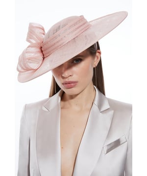 Experience high formality with a fascinator, with a large size and a curved shape, as well as a statement bow accent. Wear it with a dress in matching tones for a look perfect for race days and wedding guest days. Classic Bow Fascinator Dramatic, Large Size Statement, Curved Shape Formal Bow Accent Easy to Wear HeadbandBrowse this seasons women's fascinators or discover the full range of women's accessories now.