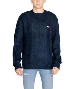Sueter de cuello redondo de punto azul Tommy Hilfiger.
  Genero: Hombres.
  Tipo: Punto.
  Temporada: Otono/Invierno.
  Color: Azul.
  Patron: Liso.
  Cierre: Slip on.
  Mangas: Largas.
  Escote: Cuello redondo.
  Composicion: 77% acrilico 4% Lycra y 19% poliester.
  Lavado: Lavar a maquina a 30Â°.
  Codigo del articulo: DM0DM19440.