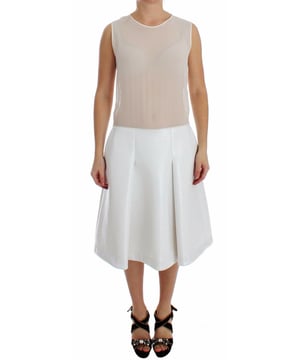 Marca: Koonhor.
  Condicion: A estrenar con etiquetas.
  Estilo: Vestido sin mangas plisado en la parte inferior.
  Color: Blanco.
  Longitud: Hasta la rodilla.
  Cierre: Cremallera en la parte trasera.
  Detalles: Detalles del logotipo.
  Origen: Hecho en Italia.