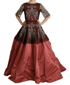 Dolce & Gabbana Crystal Embellished Silk Princess Gown
  Color: Pink crystal embellished Black netted detailing Clear crystal
  Back snap closure
  Logo details
  Made in Italy
  Material: 90% Silk 10% Nylon
  Lining: 50% Silk 50% Nylon
  Very exclusive and high craftsmanship