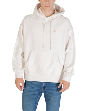 Merk: Calvin Klein Jeans
  Geslacht: Heren
  Type: Sweatshirts
  Seizoen: Herfst/Winter
  Kleur: wit
  Kraag: capuchon
  Zakken: zakken aan de voorkant
  Artikelcode: LV04RC278G
  Samenstelling: 86% katoen 14% polyester
  Wassen: machinewas op 30Â°