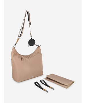 Introducing the sophisticated Baby Changing Bag With Wallet in Brown 40cm by BOSS, an essential for the chic parent and child duo this AW2024. Here are the standout features Luxurious Leather Crafted with premium brown leather, offering durability and style. Comprehensive Set Includes a spacious bag and a matching wallet, perfect for organizational needs. Versatile Design Suitable for baby boys and girls, ensuring timeless elegance for any outing.Elevate your style with this elegant baby accessory. Order now and blend functionality with luxury!