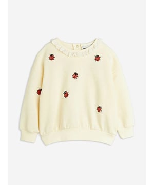 Mini Rodini combine eco-friendly materials with vibrant imaginings to create fun and unforgettable aesthetics. This girls off-white Ladybugs sweatshirt is crafted from beautiful organic cotton with all-over ladybird embroidery and a lace collar. Both charming and stylish for fashion-conscious youngsters. Round Neck Ribbed Trims Long Sleeves 100 Organic Cotton