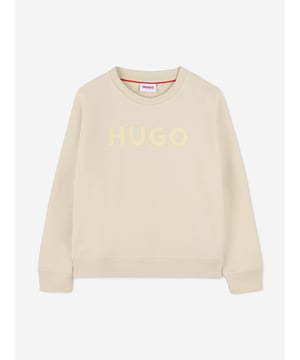 Introducing the exquisite Boys Logo Print Sweatshirt by Hugo in a sophisticated beige for SS2025. This designer piece seamlessly marries comfort with cutting-edge style, making it an essential addition to young wardrobes. Key features include Distinctive Logo Print Elevates everyday outfits with its vibrant and unique design. Premium Comfort Crafted from the finest materials to ensure a soft, luxurious feel. Versatile Style Perfectly complements both casual and dressier ensembles.Embrace elegant fashion for the young gentlemanorder the Hugo Boys Sweatshirt today!