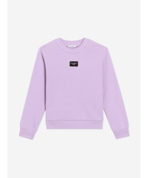 Elevate your little girl's wardrobe with the exquisite Dolce Gabbana Girls Logo Sweatshirt in regal purple. Perfect for SS2025, it exudes both comfort and luxury. Key features include Italian Craftsmanship Impeccably tailored in Italy for unmatched quality and elegance. Designer Appeal Showcasing Dolce Gabbanas iconic logo in a vibrant, eye-catching print. Luxurious Comfort Fabricated from premium materials, ensuring softness and ease for all-day wear.A splendid fusion of style and practicality, this sweatshirt is a quintessential piece for fashion-forward young ladies.