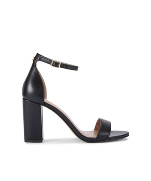This Carvela Capo Block Heel is a black block heel with simple strap across the toe and ankle. The heel is in a block style. Heel height: 8.5 cm. This product features All Day Long technology.