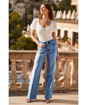 The jeans to be seen inTrending wide-leg cut - it's comfy and coolWear-with-everything mid-blue washSpun with the perfect amount of stretchYou can't go wrong with a nice top and heels for drinksStyle with a tee, trainers and bomber jacket on weekendsInside leg to fit: Short 29" | Regular 31" | Long 33"