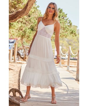 If summer were a dress...
On-trend crochet detail shows off your waist
Sexy cami straps and V-neckline
Breezy lightweight fabric
Ultra-feminine crochet trimmed maxi hem
Add sandals and a straw bag for the perfect summer outfit