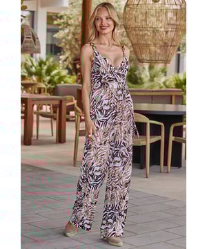A "where did you get that jumpsuit?" jumpsuit Breezy crinkle fabric makes it perfect for balmy evenings Bust-flattering V-neck framed by luxe tortoiseshell ring detail strapsCinched waist falls to comfy wide legs Maximum impact animal print Style with your favourite sandals Inside leg to fit: Short 29" | Regular 31" | Long 33"