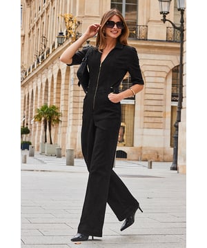Your AM to PM one-piece wonderMade from our signature soft stretch denimSexy zip frontWaist-cinching gold buckle detailElongating wide-legsJust add ankle bootsInside leg to fit: Short 29" | Regular 31" | Long 33"