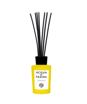 Experience the essence of the Italian countryside with the Acqua Di Parma Buongiorno Home Fragrance Diffuser. This exquisite diffuser fills your space with uplifting notes of lemon and mint, creating a fresh and invigorating atmosphere. The heart reveals a blend of aromatic rosemary, lavandin, and jasmine, while the comforting base of cedar and musk adds warmth. Perfect for enhancing your home ambiance, this 180ml diffuser is a luxurious addition to any setting. Please note that fragrances over 150ml cannot be shipped outside of the UK.