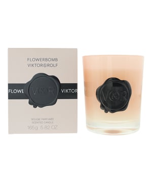 Viktor and Rolf Flowerbomb Scented Candle opens with fresh, bright notes of pink pepper, elemi, bergamot, and grapefruit, creating an invigorating and uplifting atmosphere. The heart of the scent deepens with saffron, tobacco, and leather, adding warmth and sophistication, while vetiver provides a grounding, earthy base. This elegant candle captures the essence of the iconic Flowerbomb fragrance, offering a blend of freshness and depth that transforms any room into a refined and inviting space. Burn time approximately 35 hours