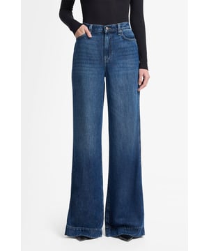 Damen  Die Modern Dojo Tailorless ist eine ikonische Schlaghose mit mittelhohem Bund, hier aus blauem Denim Lustre. Diese Basic-Jeans machen Ihnen das Styling leicht: Tragen Sie dazu einfach ein weißes Tanktop und elegante Stiefeletten. Die Jeans von 7 For All Mankind werden aus Premiumstoffen hergestellt.