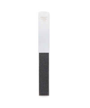 Achieve Beautiful Feet with Margaret Dabbs Professional Foot File and Replacement Pads. This ultimate foot care tool is designed for easy hard skin removal, ensuring a smooth and soft finish. The self-adhesive pads provide a safe and effective way to eliminate callus build-up. Enjoy the luxury of salon-quality foot care in your own home. Ideal for women seeking to elevate their foot care routine. Please note: Avoid using on broken or irritated skin and do not overfile.