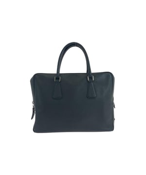 Secure zip closure for added safety
  Convenient handle for easy carrying
  Ideal as a versatile carryall bag
Material: Leather