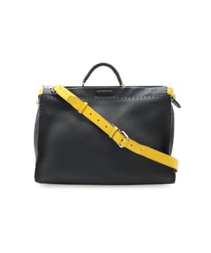 Structured silhouette for a modern look
  Features a top handle for easy carrying
  Optional shoulder strap for versatile wear
  Crafted from durable leather
Material: Leather