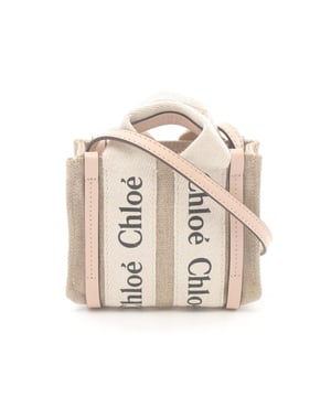Textile construction
  Features top handles
  Includes adjustable shoulder strap
  Designed with an open top
Material: Canvas