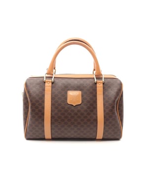 Handtasche mit Henkel oben.
  Verfugt uber ein dekoratives Design.
  Funktional und vielseitig einsetzbar.