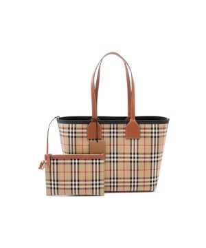Bolso de lona.
  Bolsillo interior con cremallera.
  Bolsa desmontable.
  Opcion de transporte versatil.
  Construccion duradera.