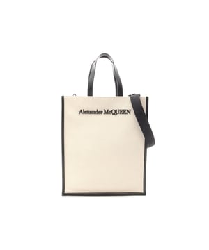 Crafted from durable canvas material.
  Features an adjustable shoulder strap for comfortable carrying.
  Includes internal card slots for convenient storage.
  Ideal for everyday use.